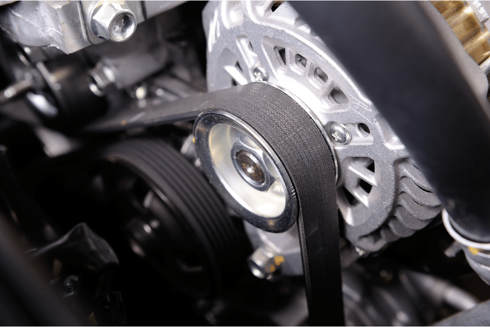 Timing Belt Warning Signs. Auto repair in Springboro, OH. Springboro Automotive. Close-up view of a car engine’s serpentine belt and alternator pulley.